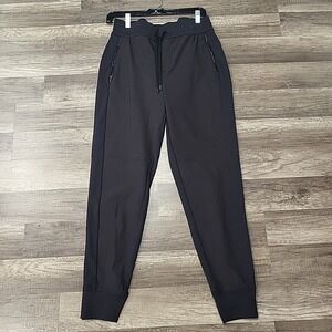 Athleta Headlines Hybrid Jogger Pants Womens Size 8 Black Stretch Zip Pockets